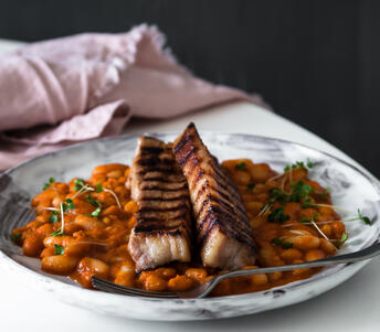 sweet cured belly pork steaks & baked beans cooked