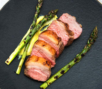 lamb rump cooked with aioli and asparagus 