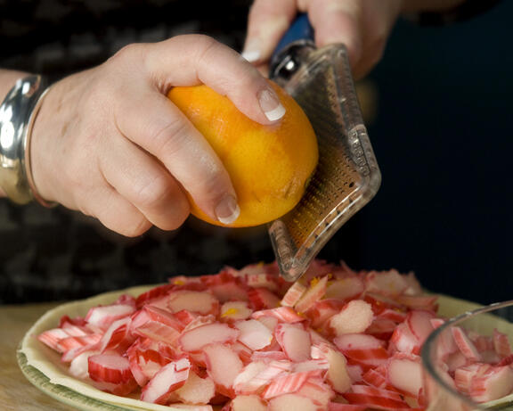 adding orange zest to rhubarb