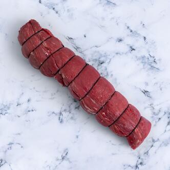 whole beef fillet on marble background 