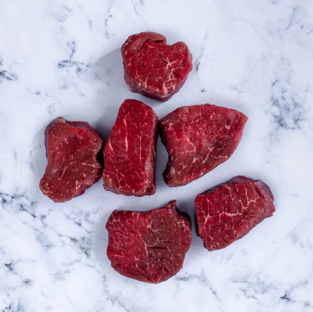 chopped fillet medallion on marble background