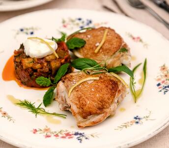 cooked lemon scented chicken with spiced aubergine