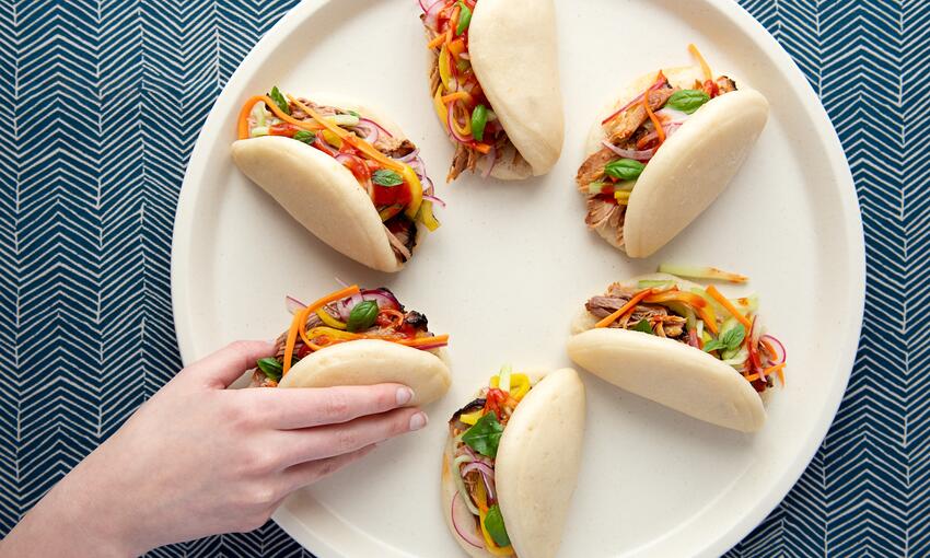 pulled pork with hirata buns and asian style pickles cooked