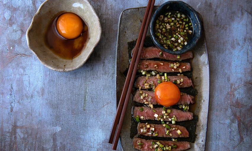 rump steak with soy cured egg and seaweed cooked