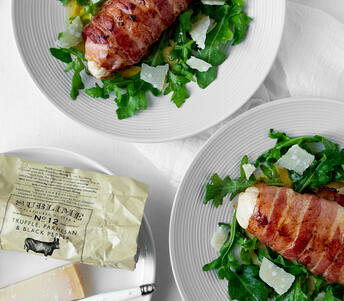 chicken breast wrapped in pancetta stuffed with truffle, parmesan & black pepper butter cooked