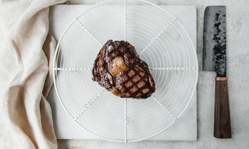 rib eye steak with tahini, lemon & spinach cooked