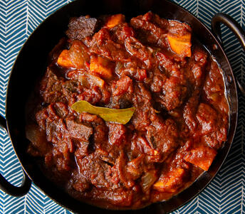 beef madras cooked with pumpkin and basil 
