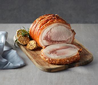 cooked porchetta with apple and winter sauce 