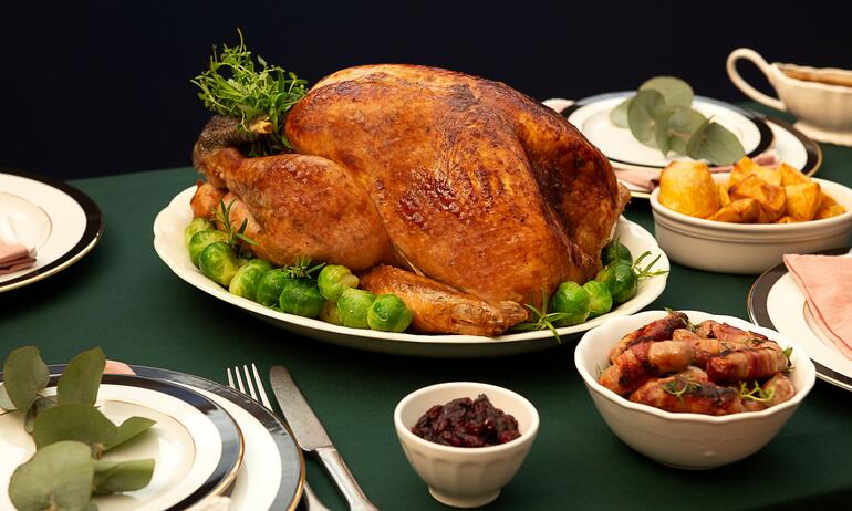 roasted whole turkey on table 