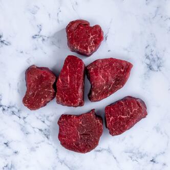 chopped fillet medallion on marble background