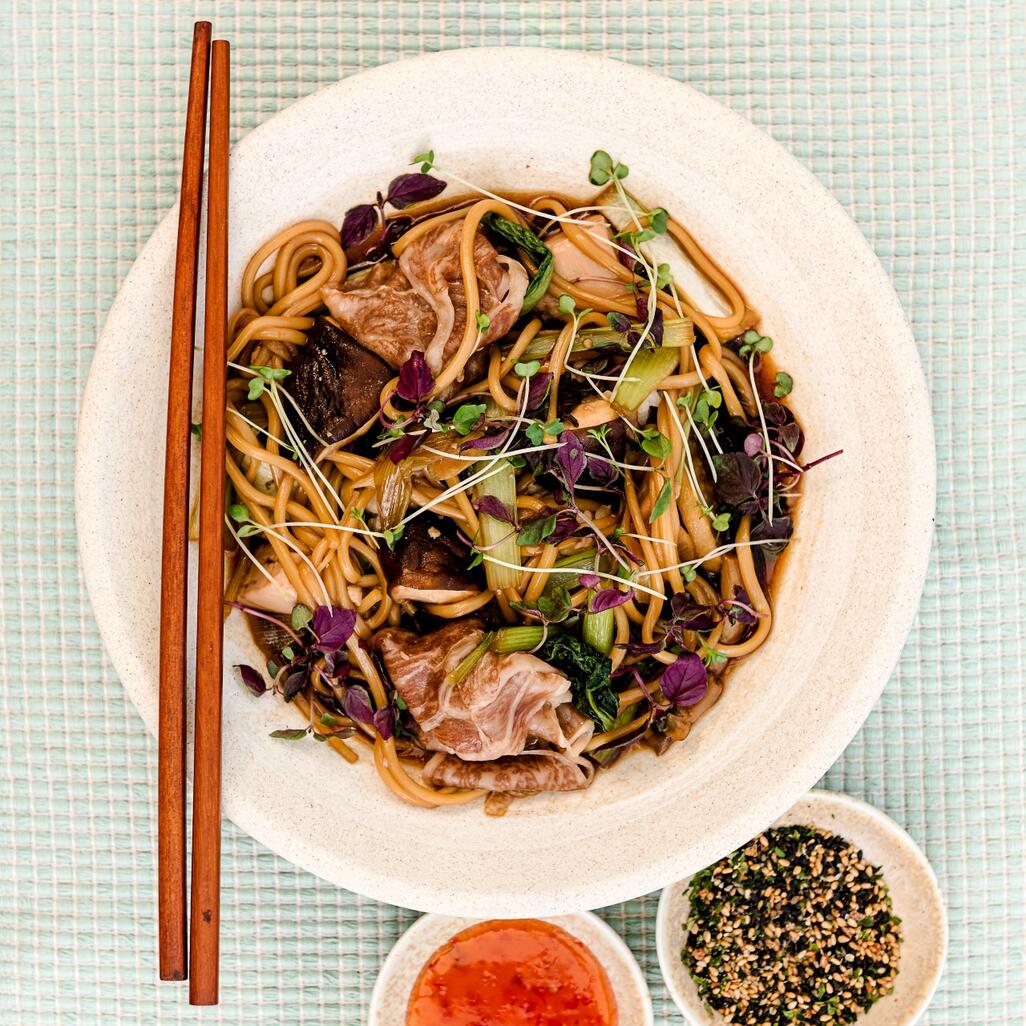 japanese chopsticks on cooked wagyu beef suyaki